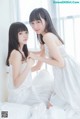 Coser @ 桜 桃 喵 Vol.045: 白色 长裙 (58 photos) P39 No.ab57a1