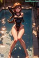 A woman in a black bathing suit standing in a pool.